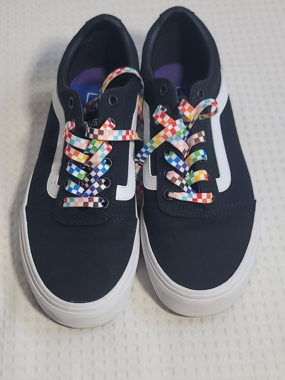 Vans Women  Black and White Canvas Sneakers with Rainbow Check Laces